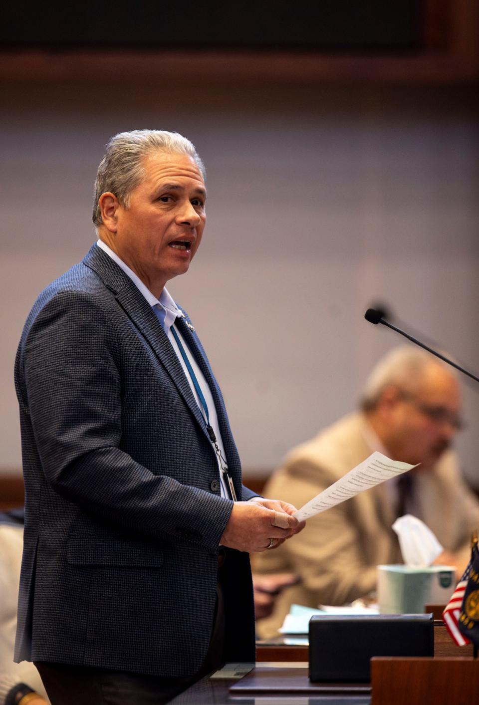 Sen. Mark Meek​​, D-Clackamas, speaks about his uncle’s struggle with drug addiction as his remains sit on his desk on Friday, March 1, 2024 at the Oregon State Capitol in Salem, Ore.