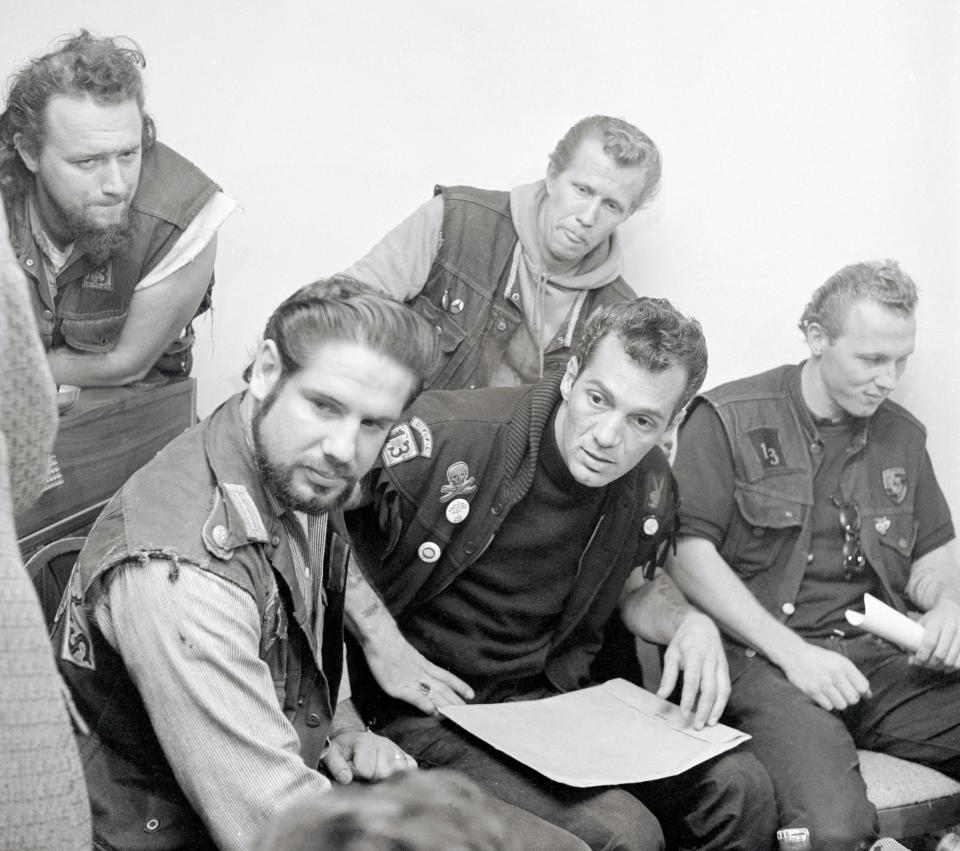 Barger, second right, with fellow Hells Angels in 1965 at a press conference to announce that they would not oppose an anti-Vietnam War march the following day: a few weeks previously they had clashed with protestors at another march - Bettmann