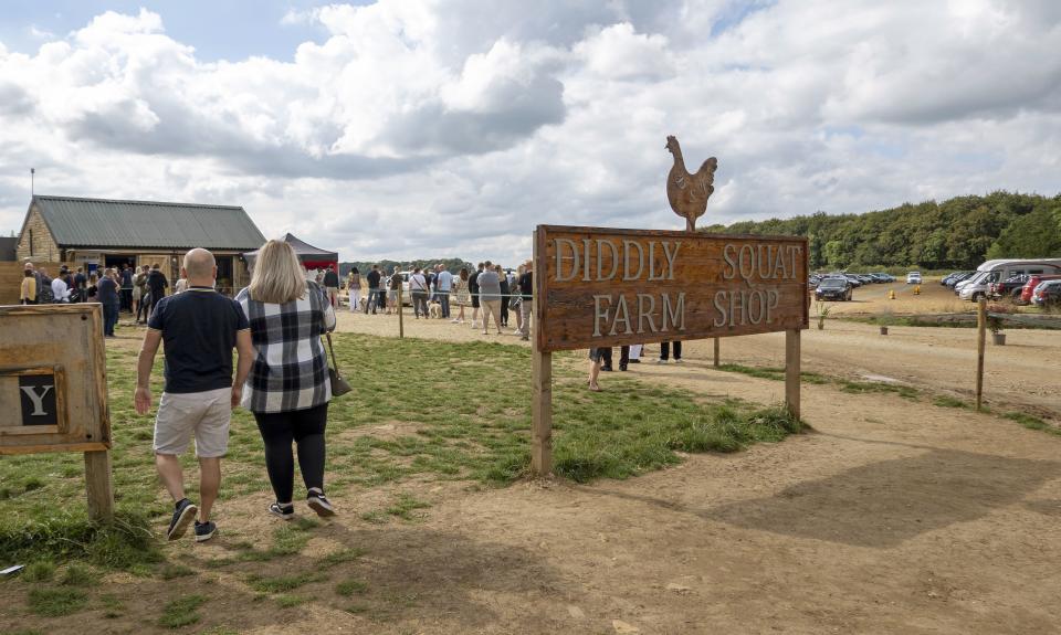 Customers queue at Diddly Squat shop. (Getty Images)