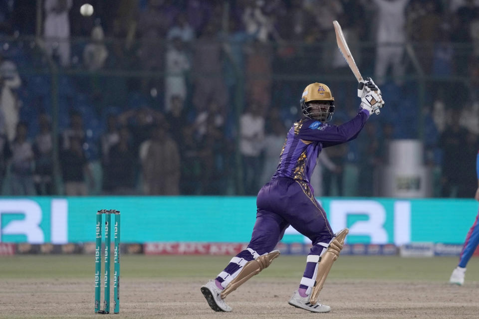 Quetta Gladiators' Sherfane Rutherford plays a shot during the Pakistan Super League T20 cricket match between Karachi Kings and Quetta Gladiators, in Karachi, Pakistan, Thursday, Feb. 29, 2024. (AP Photo/Fareed Khan)