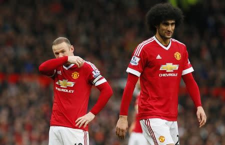 Britain Football Soccer - Manchester United v Leicester City - Barclays Premier League - Old Trafford - 1/5/16 Manchester United's Marouane Fellaini and Wayne Rooney look dejected Action Images via Reuters / Jason Cairnduff/ Livepic