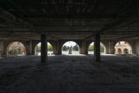 <p>“Once inside, the lower floors were used as a local dump and toilet, not too pleasant and I expected somebody could turn up every second. The side buildings have some gorgeous stairs, it must have looked awesome in its heyday.” (Photo: Bob Thissen/Caters News) </p>