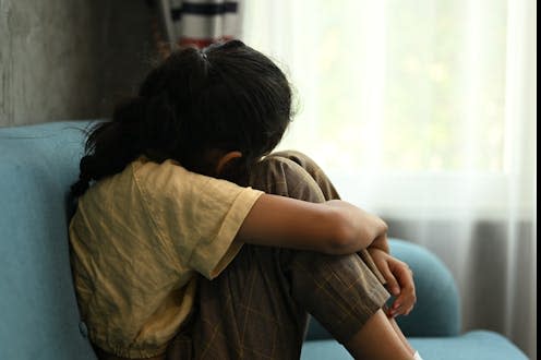 <span class="caption">The health and wellbeing of primary school children declined between 2014 and 2022.</span> <span class="attribution"><a class="link " href="https://www.shutterstock.com/image-photo/lonely-sad-girl-student-crying-hug-2304840233" rel="nofollow noopener" target="_blank" data-ylk="slk:1st footage/Shutterstock;elm:context_link;itc:0;sec:content-canvas">1st footage/Shutterstock</a></span>