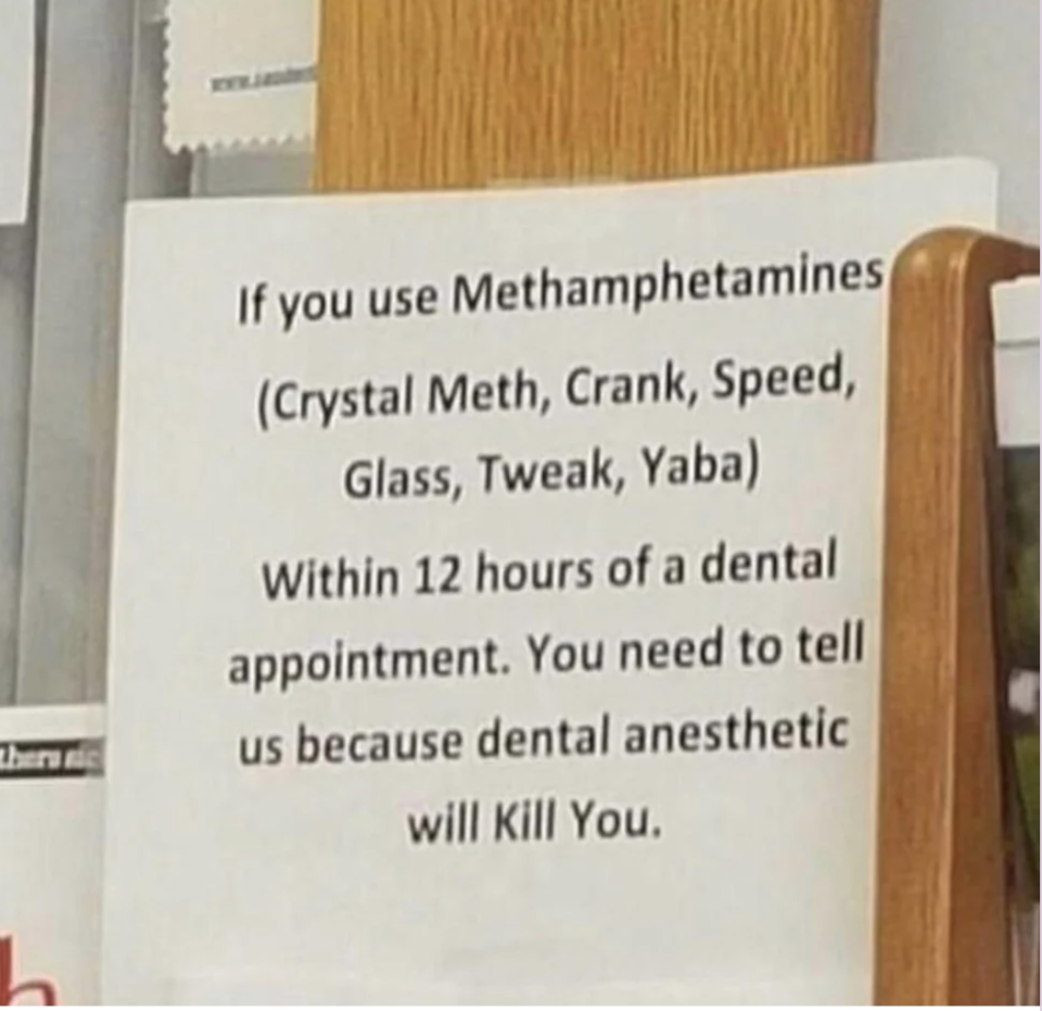 A sign reads "if you use methamphetamines within 12 hours of a dental appointment, you need to tell us because dental anesthetic will kill you"