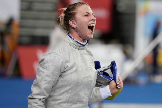 <p>Lee Jin-man/AP Photo</p> Olga Kharlan of Ukraine after defeating Cyrielle Rioux of France during the women's FIE fencing sabre grand prix competition in Seoul, South Korea, on April 29, 2023.