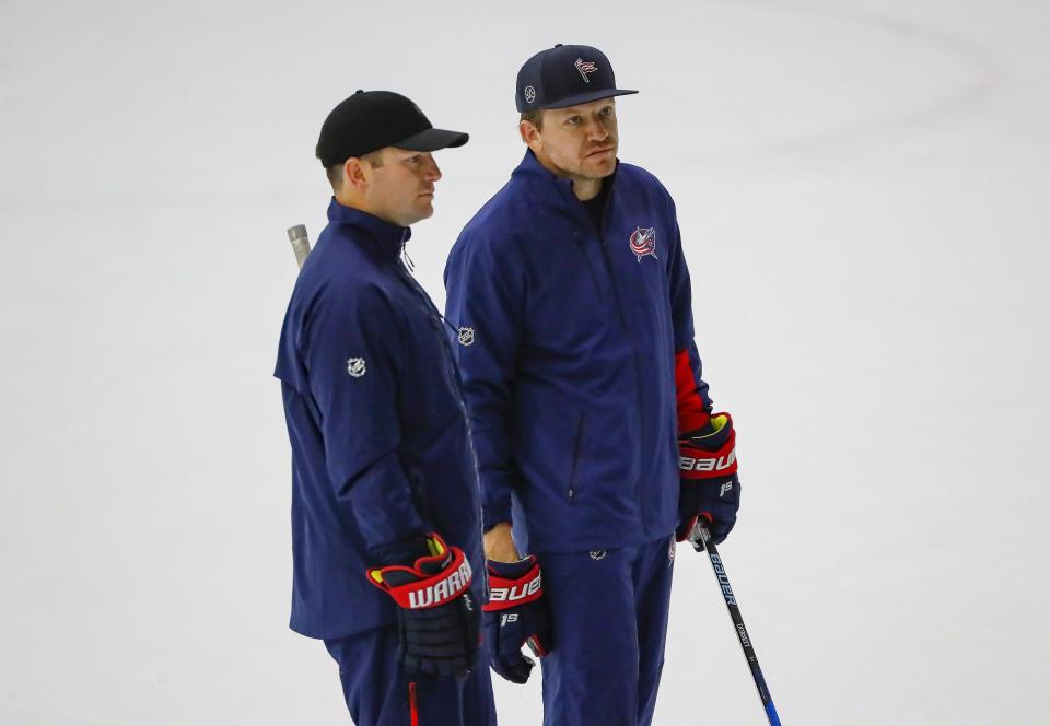Former Columbus Blue Jackets players, now assistants, Mark Letestu, left, and Derek Dorsett help lead development camp at the OhioHealth Ice Haus in Columbus on Tuesday, Sept. 14, 2021. 