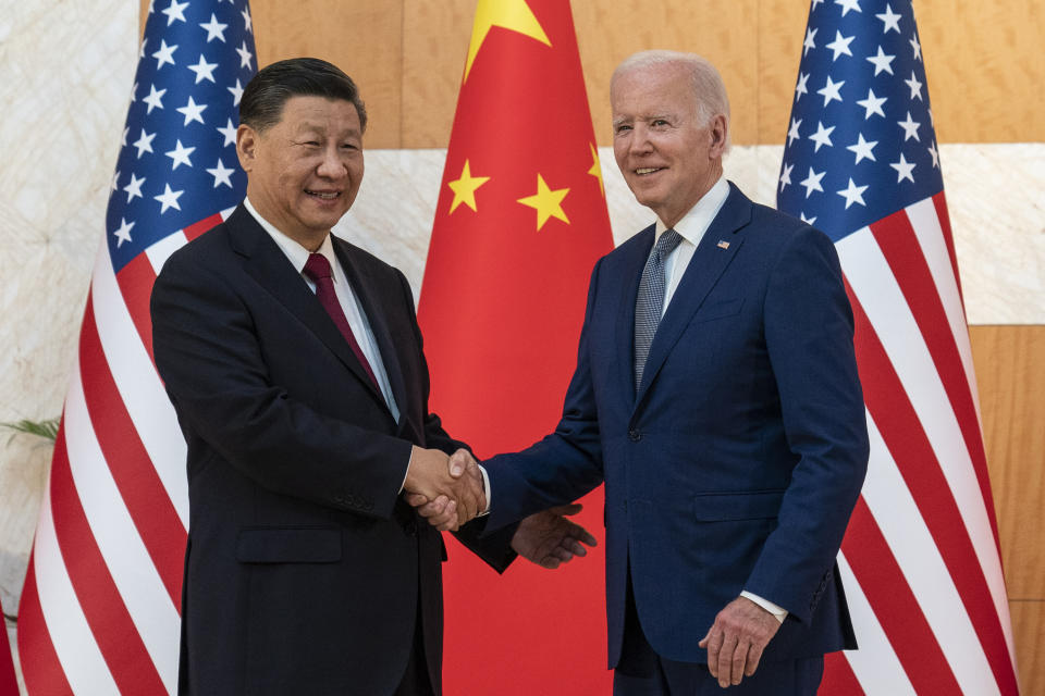 FILE - U.S. President Joe Biden, right, and Chinese President Xi Jinping shake hands before a meeting on the sidelines of the G20 summit meeting in Bali, Indonesia Nov. 14, 2022. Leaders of the Group of Seven advanced economies are generally united in voicing concern about China. The question is how to translate that worry into action. (AP Photo/Alex Brandon, File)