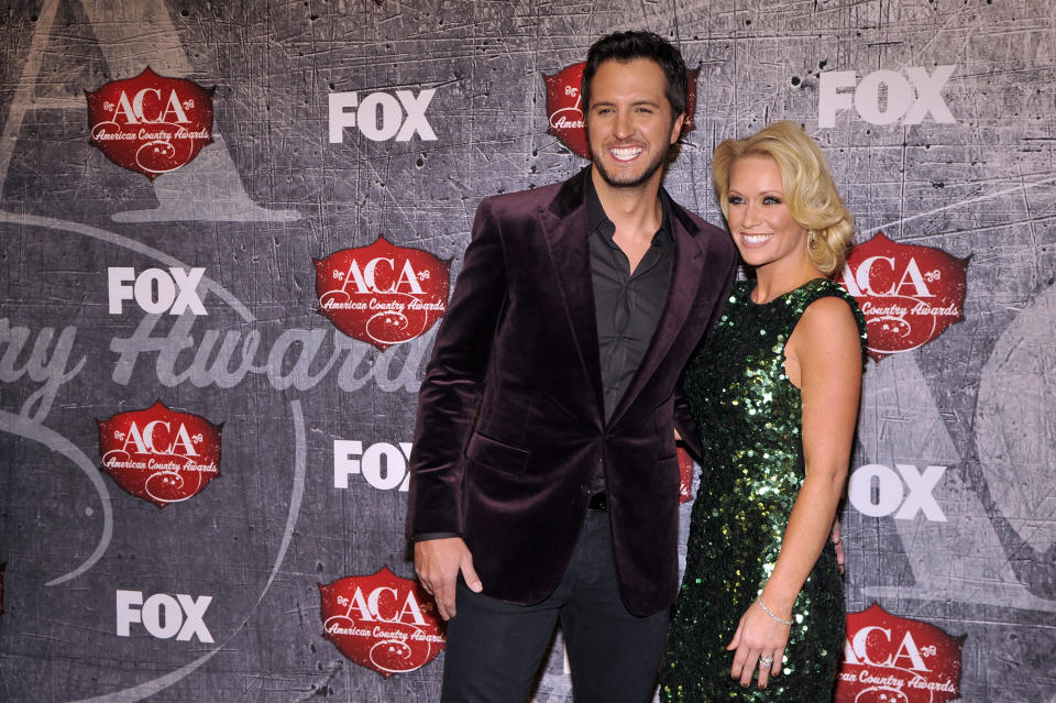 From left, singer Luke Bryan and Caroline Boyer arrive at the American Country Awards on Monday, Dec. 10, 2012, in Las Vegas. (Photo by Jeff Bottari/Invision/AP)