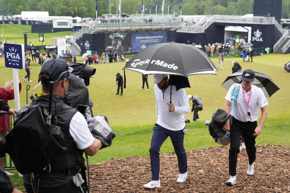 Scottie Scheffler walks to the tee for the second round of the PGA Championship golf tournament at the Valhalla Golf Club, Friday, May 17, 2024, in Louisville, Ky. (AP Photo/Matt York)