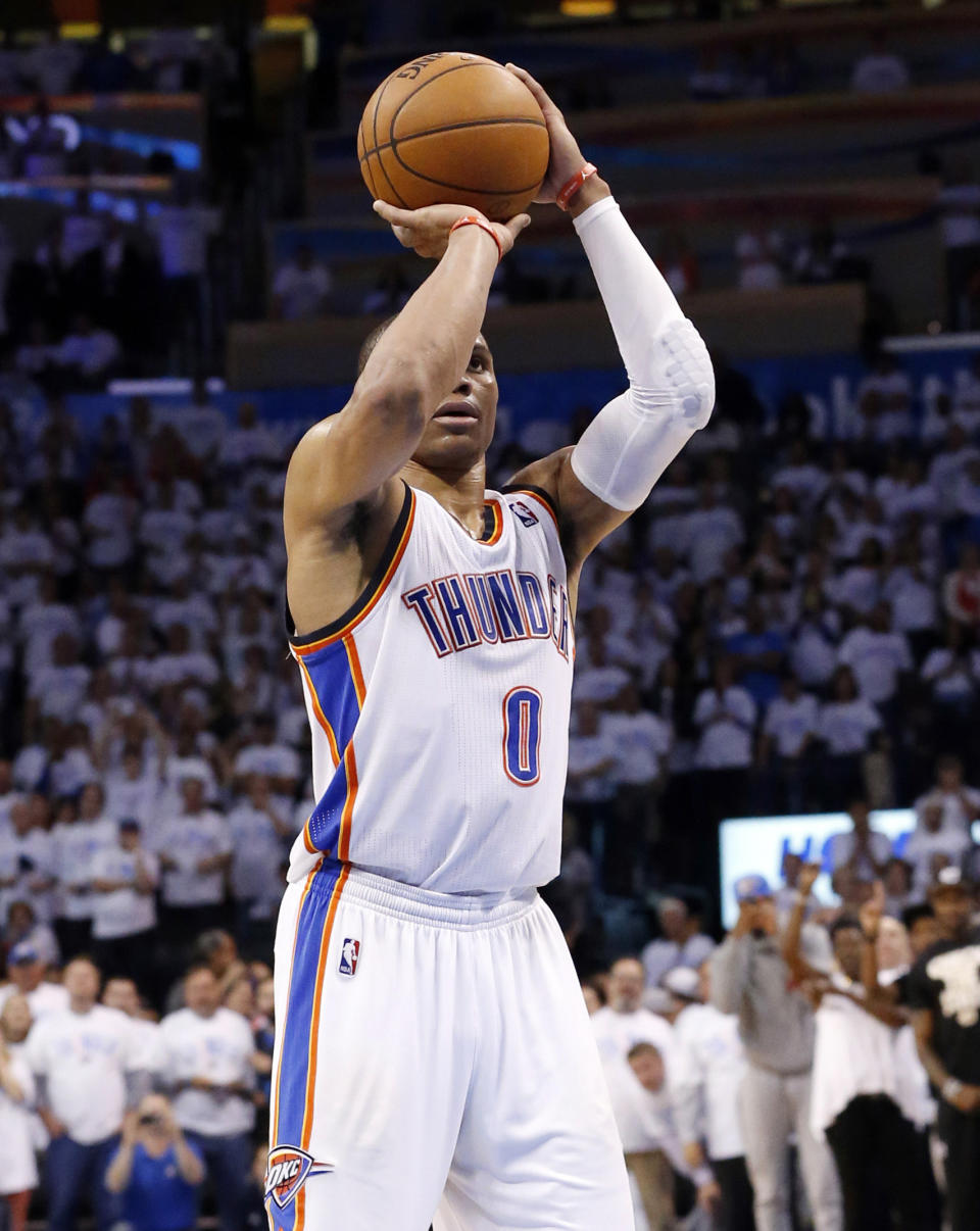 Oklahoma City Thunder guard Russell Westbrook shoots his game-winning foul shot in the fourth quarter of Game 5 of the Western Conference semifinal NBA basketball playoff series against the Los Angeles Clippers in Oklahoma City, Tuesday, May 13, 2014. Oklahoma City won 105-104. (AP Photo)