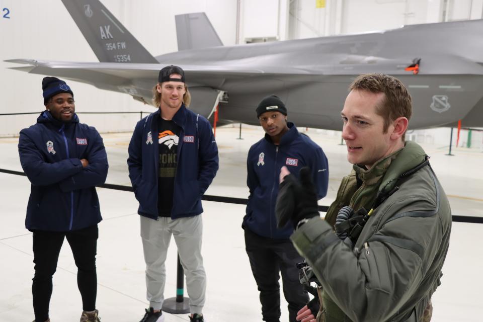 Indianapolis Colts cornerback Kenny Moore II, Denver Broncos tight end/fullback Andrew Beck and Cleveland Browns running back/receiver Demetric Felton Jr. (left to right) on an NFL-USO trip to Alaska in 2022.