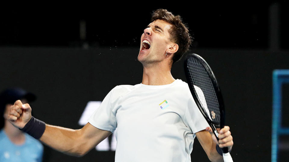 Seen here, Thanasi Kokkinakis roars in delight after reaching the final of the Adelaide International. 