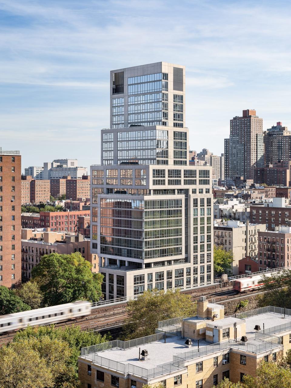 The exterior of 1399 Park Avenue with its abstract, glass designed