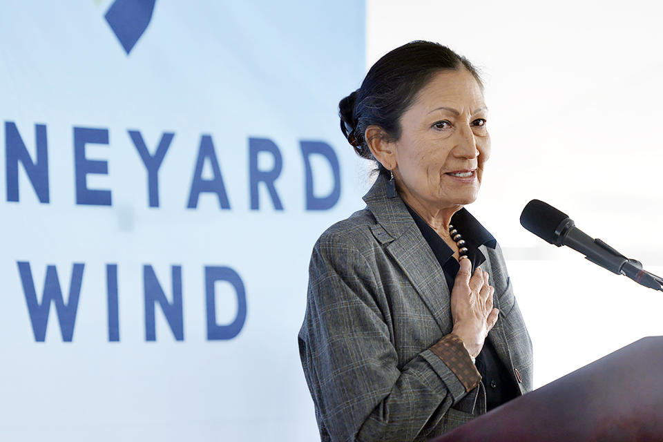 FILE - Secretary of the Interior Deb Haaland speaks about the Vineyard Wind project during a groundbreaking ceremony in Centerville, Mass., Nov. 18, 2021. The Biden administration said Wednesday it will hold its first offshore wind auction next month, offering nearly 500,000 acres off the coast of New York and New Jersey for wind energy projects that could produce enough electricity to power nearly 2 million homes. (Merrily Cassidy/Cape Cod Times via AP, File)