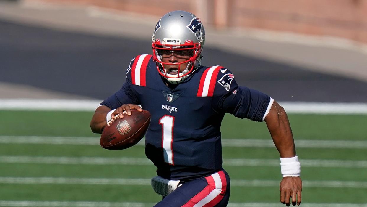 Mandatory Credit: Photo by Steven Senne/AP/Shutterstock (10965600a)New England Patriots quarterback Cam Newton scrambles against the Denver Broncos in the first half of an NFL football game, in Foxborough, MassPatriots Football, Foxborough, United States - 18 Oct 2020.