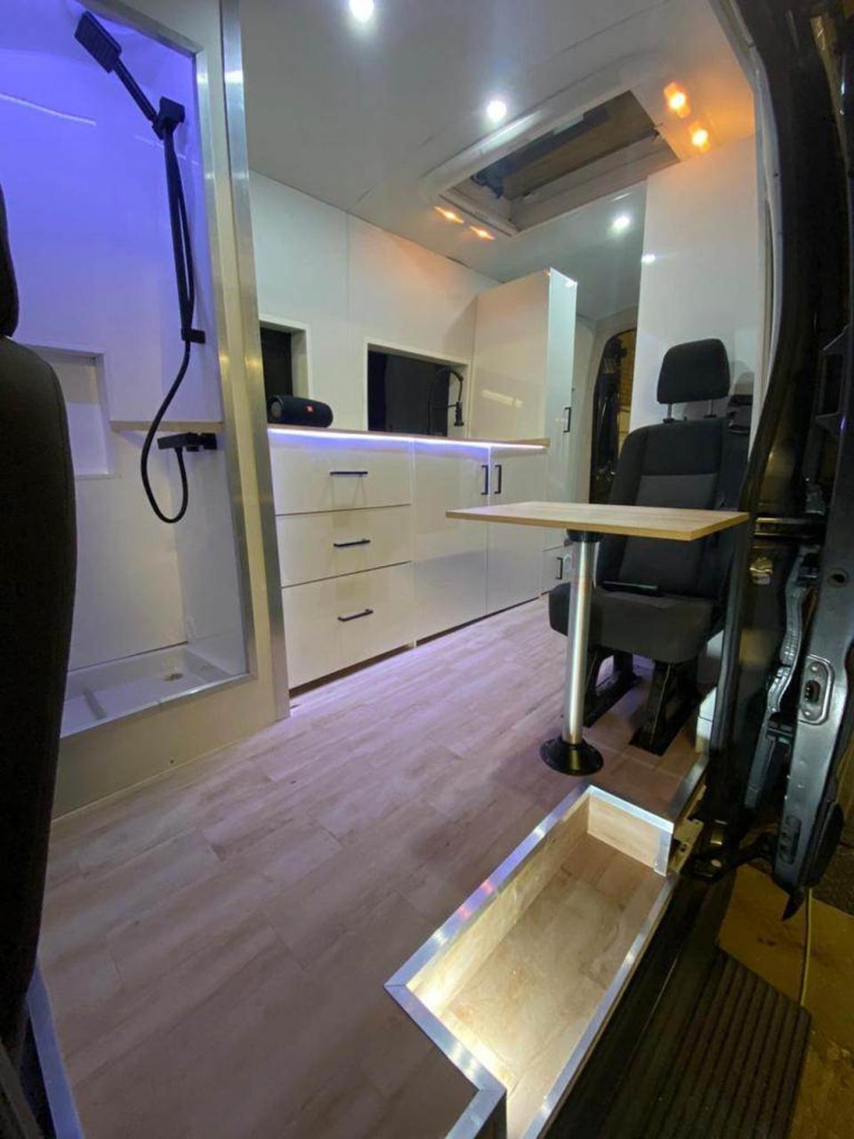 The couple fitted the van with a generous kitchen and shower (Robert Bolohan)