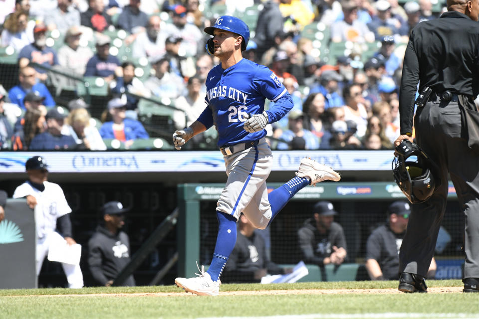 Kansas City Royals' Adam Frazier scores a run on a sacrifice fly by Bobby Witt Jr. in the third inning of a baseball game against the Detroit Tigers, Friday, April. 26, 2024, in Detroit. (AP Photo/Jose Juarez)