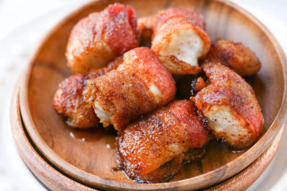 <p>Greens & Chocolate</p><p>Who doesn't love bacon? These sweet and spicy bacon-wrapped chicken bites are hearty and perfect for meat lovers. </p><p><strong>Get the recipe: <a href="https://greensnchocolate.com/sweet-and-spicy-bacon-wrapped-chicken-bites/" rel="nofollow noopener" target="_blank" data-ylk="slk:Sweet and Spicy Bacon Wrapped Chicken Bites;elm:context_link;itc:0;sec:content-canvas" class="link ">Sweet and Spicy Bacon Wrapped Chicken Bites</a></strong></p><p><strong>Related: <a href="https://parade.com/917122/sarahhardy/low-carb-and-keto-bacon-recipes/" rel="nofollow noopener" target="_blank" data-ylk="slk:25 Low-Carb Bacon Recipes;elm:context_link;itc:0;sec:content-canvas" class="link ">25 Low-Carb Bacon Recipes</a></strong></p>