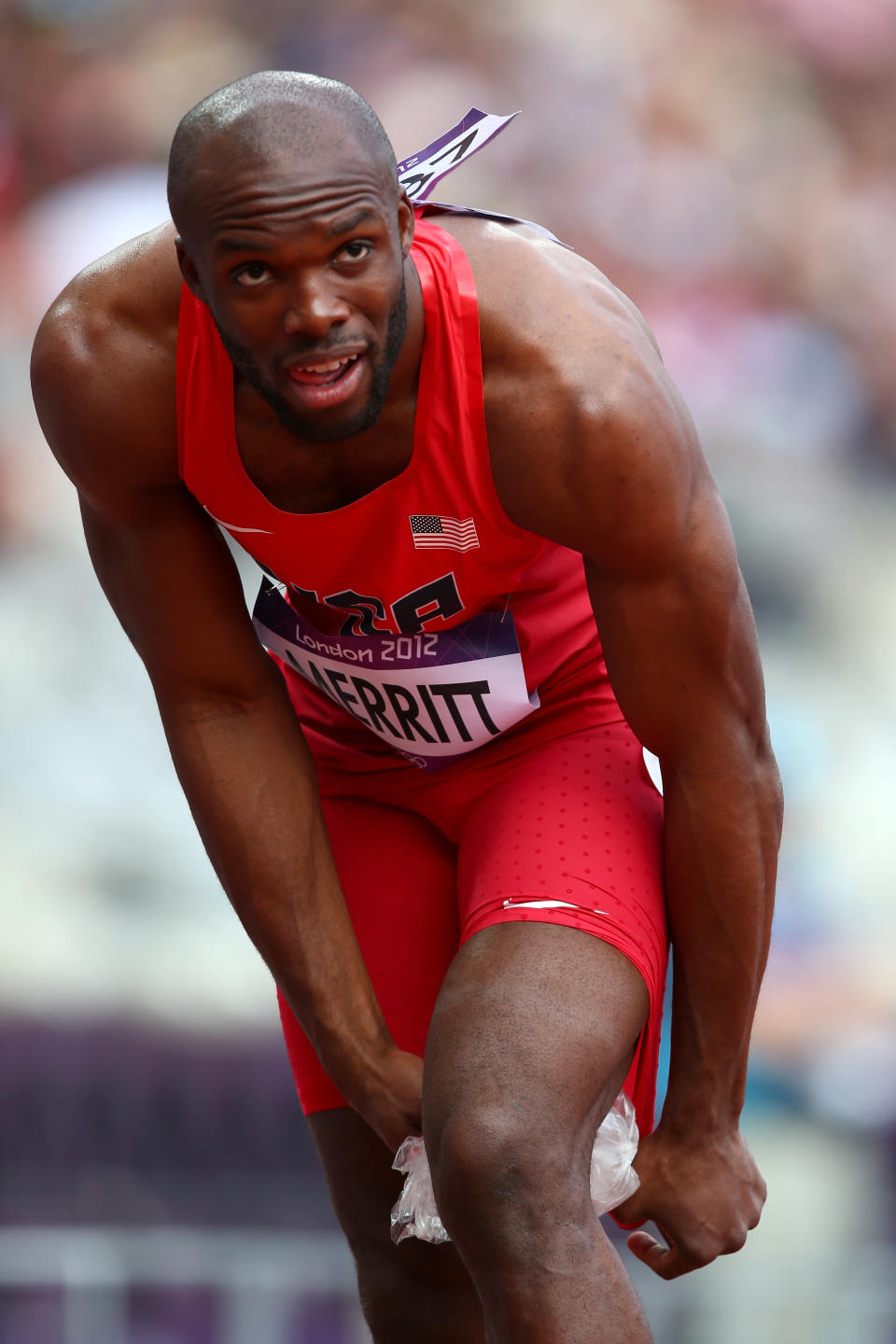 Lashawn Merritt of the United States pulls out with a hamstring injury in the Men's 400m Round 1 Heats on Day 8 of the London 2012 Olympic Games at Olympic Stadium on August 4, 2012 in London, England. (Photo by Michael Steele/Getty Images)
