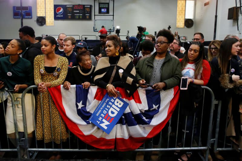 People wait to meet Democratic U.S. presidential candidate and former U.S. Vice President Joe Biden at the end of a campaign event at Saint Augustine's University in Raleigh