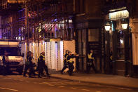 <p>Armed police raid The Blue Eyed Maid in Borough high street at London Bridge on June 3, 2017 in London, England. Police have responded to reports of a van hitting pedestrians on London Bridge in central London. (Carl Court/Getty Images) </p>