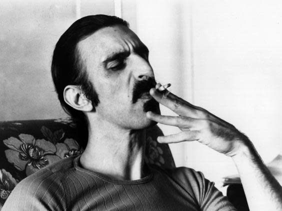 The musician in 1977: although vehemently anti-drugs, Zappa considered cigarettes to be food (Getty)