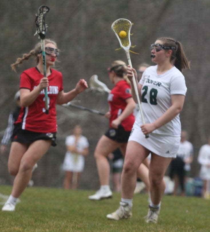 Dover High School's Lily Hunt (28) scored a career-high seven goals in Dover's 21-0 win over Spaulding on Wednesday afternoon at Dover High School.
