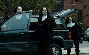 The moment when a cop sees a carload of nun-masked robbers and turns away was based on real life - Film Stills