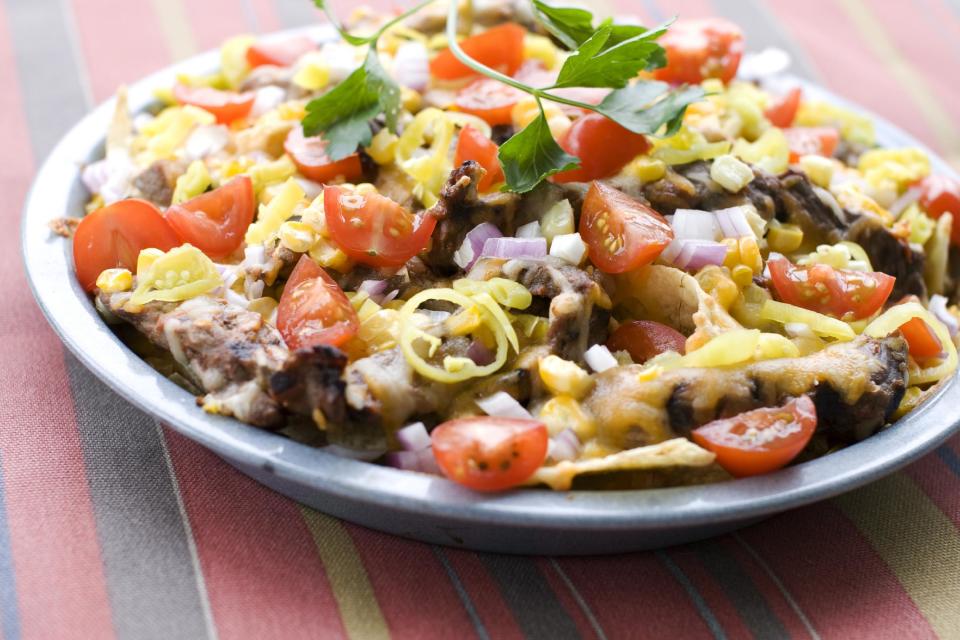 In this image taken on June 10, 2013, corn and steak grilled nachos are shown in Concord, N.H. (AP Photo/Matthew Mead)