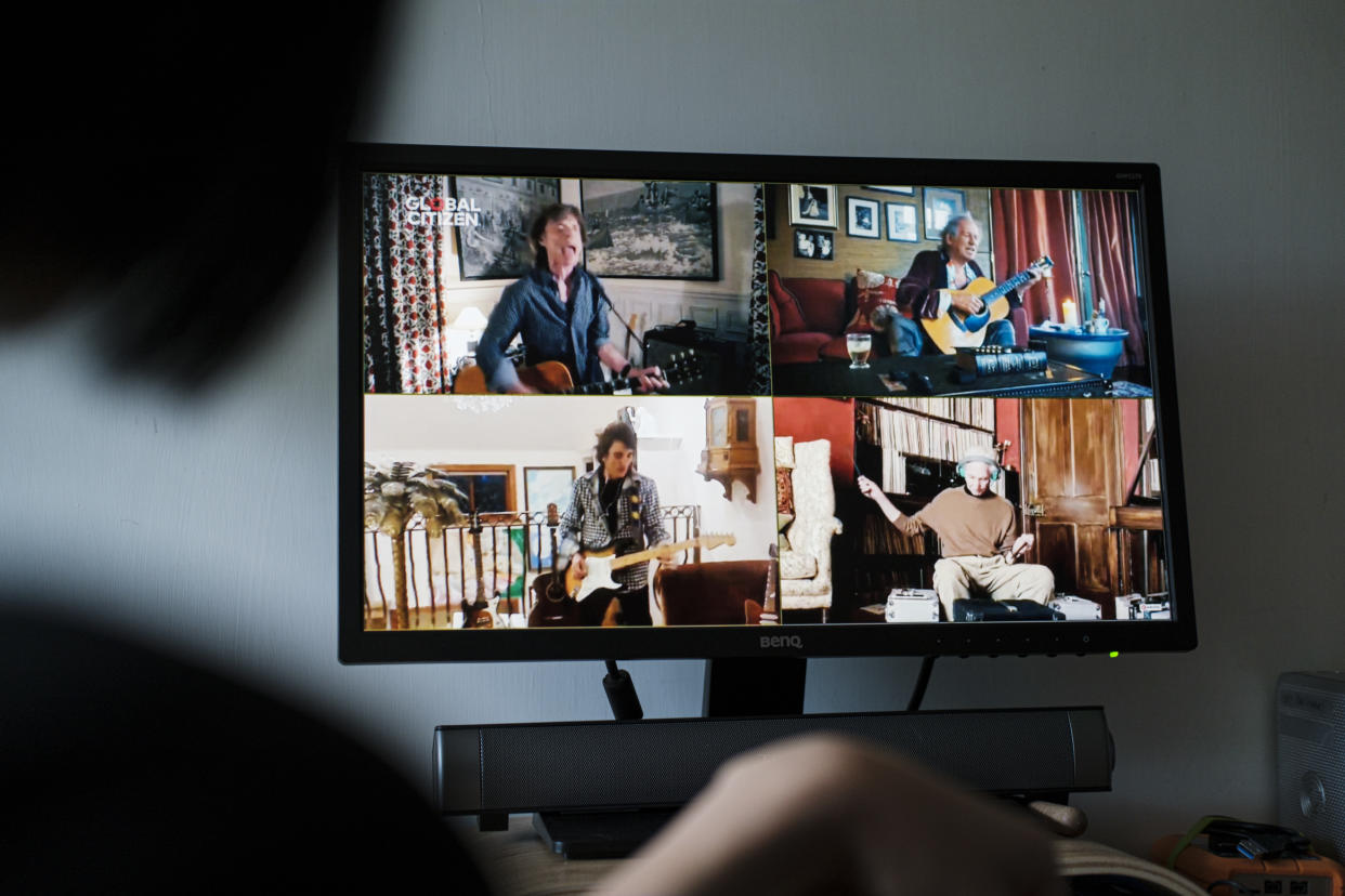 HONG KONG, CHINA - APRIL 19: English rock band The Rolling Stones are seen performing live on screen as One World Together At Home is streaming live on a computer on April 19, 2020 in Hong Kong, China. One World Together At Home is a campaign rallying funds for the COVID-19 Solidarity Response Fund for the World Health Organization. The WHO's mission for COVID-19 is to prevent, detect, and respond to the pandemic. (Photo by Keith Tsuji/Getty Images)