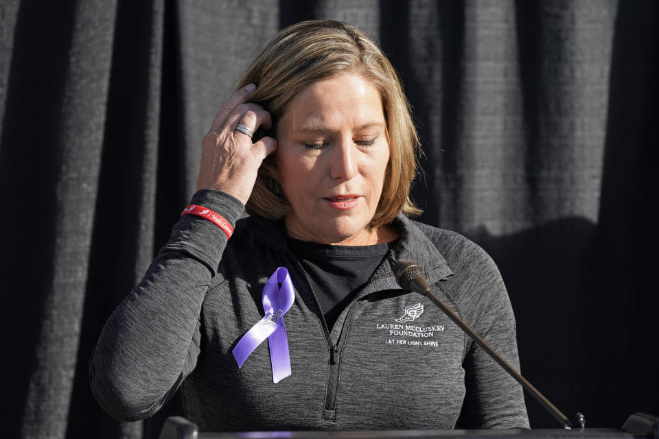 Jill McCluskey, the mother of slain University of Utah student-athlete Lauren McCluskey speaks during a press conference announcing they have reached a settlement in their lawsuit against the University of Utah Thursday, Oct. 22, 2020, in Salt Lake City. (AP Photo/Rick Bowmer)