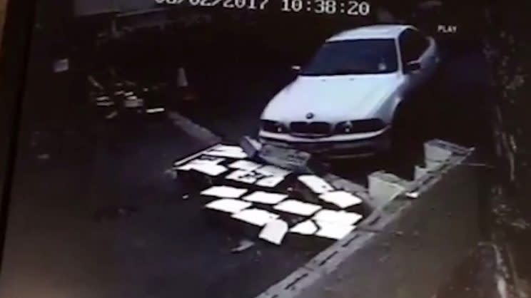 The car smashes down the structure (Picture: Wales News Service)