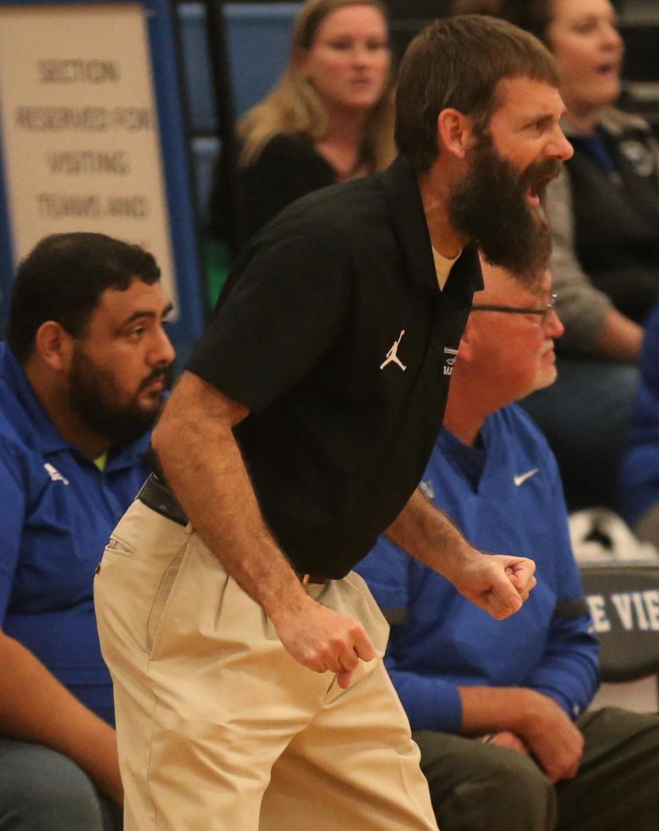 Lake View High School head boys basketball coach Courtney Bliskey shouts out instructions during a game against San Angelo TLCA at the Doug McCutchen Memorial Tournament at Ben Norton gym on Thursday, Dec. 2, 2021.