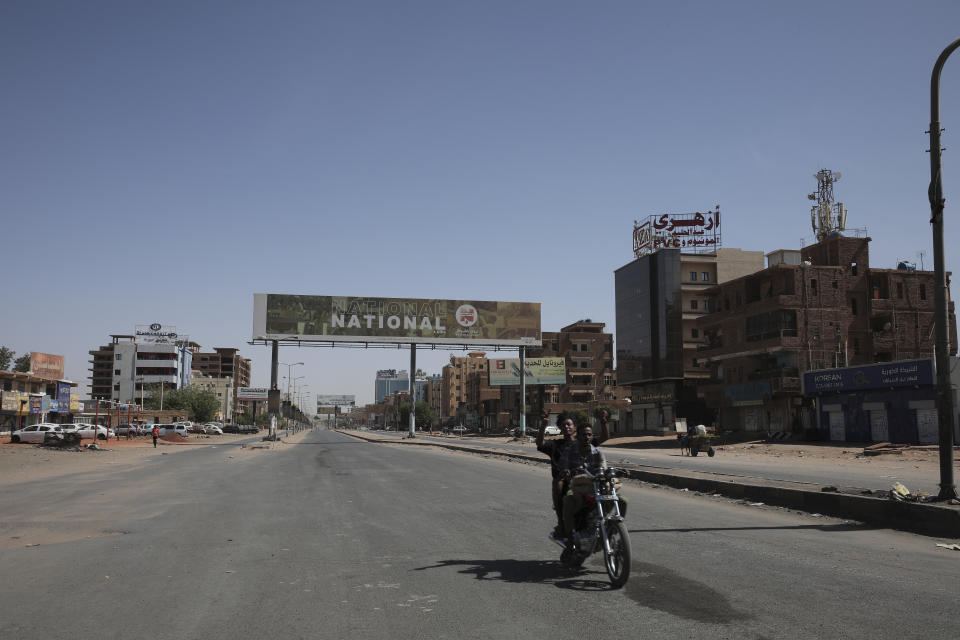 A deserted avenue is seen in Khartoum, Sudan, Tuesday, April 18, 2023. Sudan's embattled capital has awoken to a fourth day of heavy fighting between the army and a powerful rival force for control of the country. Airstrikes and shelling intensified on Monday in parts of Khartoum and the adjoining city of Omdurman. (AP Photo/Marwan Ali)