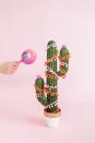 <p>This is the year Christmas cacti become a thing. Deck them out with garlands or string lights for an alternative to an evergreen. </p><p>See more at <a href="https://sugarandcloth.com/diy-christmas-tree-cactus/" rel="nofollow noopener" target="_blank" data-ylk="slk:Sugar & Cloth;elm:context_link;itc:0;sec:content-canvas" class="link ">Sugar & Cloth</a>.</p>