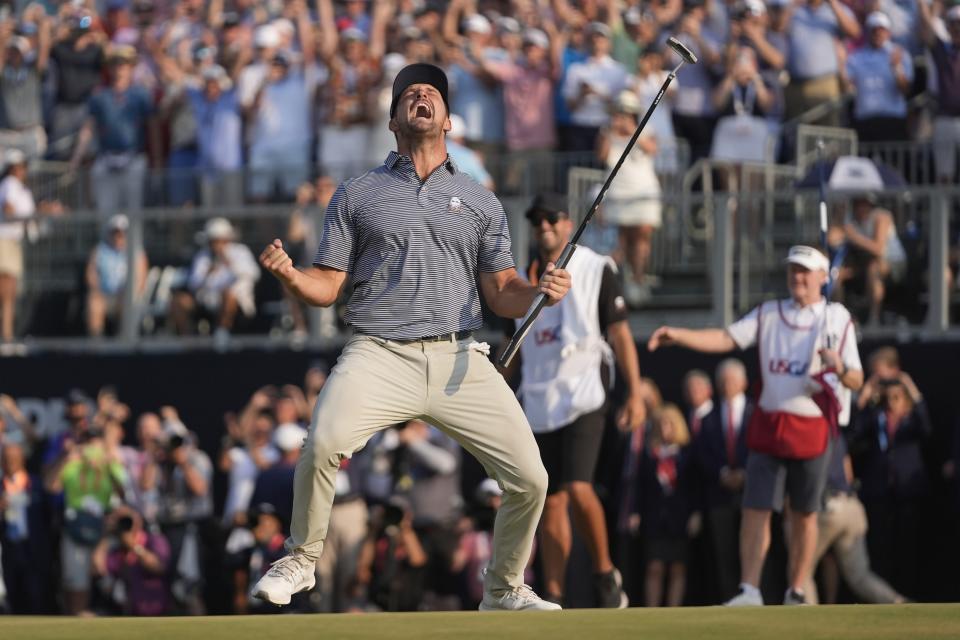 Bryson DeChambeau celebrates after winning the U.S. Open golf tournament Sunday, June 16, 2024, in Pinehurst, N.C. (AP Photo/Frank Franklin II)