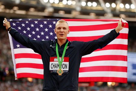 Athletics - World Cup London 2018 - London Stadium, London, Britain - July 15, 2018 Sam Kendricks of the U.S. celebrates winning the men's pole vault Action Images via Reuters/John Sibley