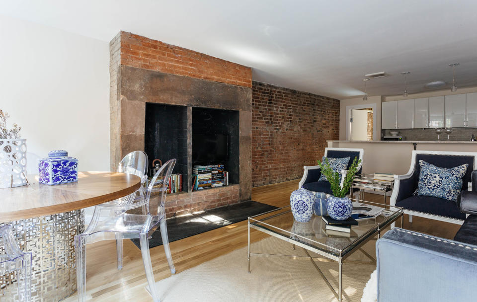 <p><strong>Location:</strong> Chelsea, New York</p> <p>Take in garden views as you sit on upholstered chairs beside a brick ornamental fireplace. </p> <p>For more info, visit <a rel="nofollow noopener" href="https://www.onefinestay.com/homes/new-york/chelsea-gardens/" target="_blank" data-ylk="slk:onefinestay.com;elm:context_link;itc:0;sec:content-canvas" class="link ">onefinestay.com</a></p>