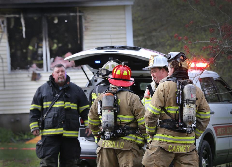 South Berwick Fire Chief Nick Hamel, center, leads the a response to a house fire at 32 Witchtrot Road Tuesday, May 2, 2023.