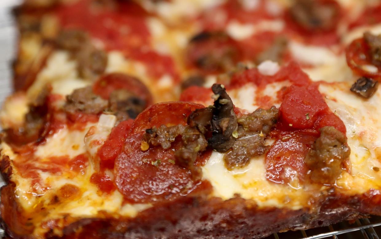 The crispy edges of the Detroit pizza at Squirrel's Pizza at Eastern Wharf.