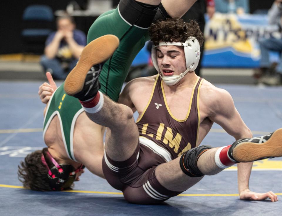 Copenhagen's Chase Nevills defeated Christopher Noto from Honeoye Falls-Lima to win the Division II 124 pound championship Saturday. Nevills was also 2023 state champion.