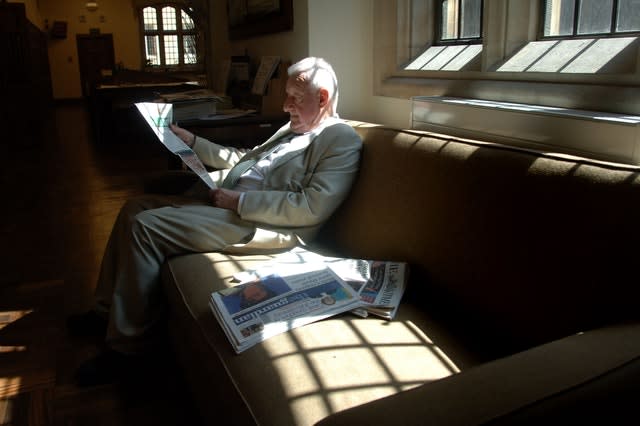 Press Association political correspondent Chris Moncrieff reads through the day’s newspapers in the Press Gallery in Westminster