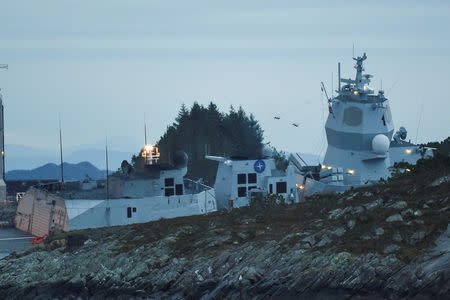 The Norwegian frigate "KNM Helge Ingstad" takes on water after a collision with the tanker "Sola TS" in Oygarden, Norway, November 8, 2018. NTB Scanpix/Marit Hommedal via REUTERS