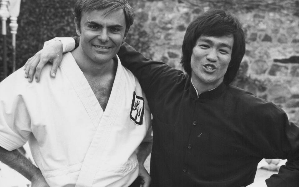 John Saxon with Bruce Lee on the set of Enter the Dragon - Stanley Bielecki Movie Collection / Moviepix