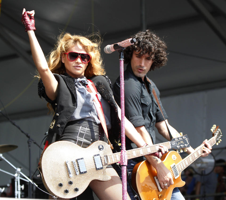 Paulina Rubio performs at the New Orleans Jazz and Heritage Festival in New Orleans, Saturday, May 5, 2012. (AP Photo/Gerald Herbert)