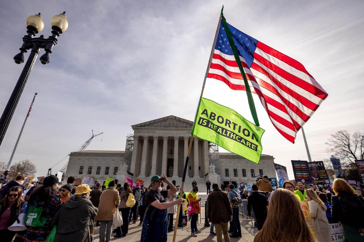 Demonstrators protest outside the Supreme Court building shortly before the court heard arguments about mifepristone on March 26, 2024. <a href="https://www.gettyimages.com/detail/news-photo/demonstrators-protest-and-argue-outside-the-u-s-supreme-news-photo/2110561340?adppopup=true" rel="nofollow noopener" target="_blank" data-ylk="slk:Michael Nigro/Pacific Press/LightRocket via Getty Images;elm:context_link;itc:0;sec:content-canvas" class="link ">Michael Nigro/Pacific Press/LightRocket via Getty Images</a>