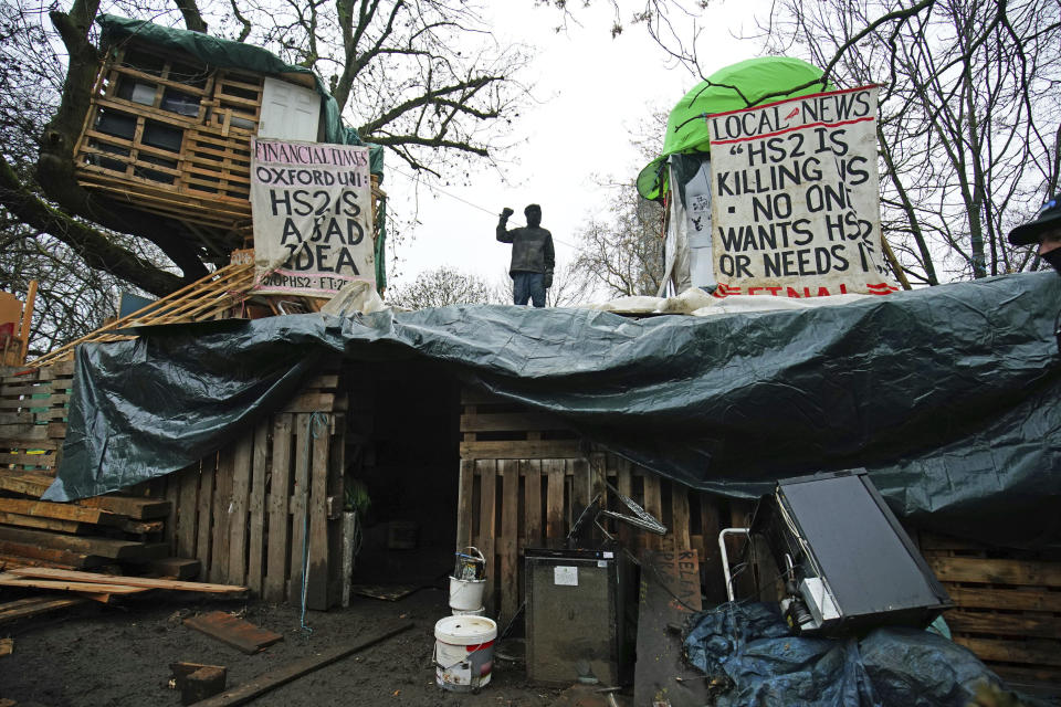 The encampment in Euston Square Gardens in central London, Wednesday Jan. 27, 2021. Protesters against a high-speed rail link between London and the north of England said Wednesday that some of them have been evicted from a park in the capital after they dug tunnels and set up a makeshift camp. (Aaron Chown/PA via AP)
