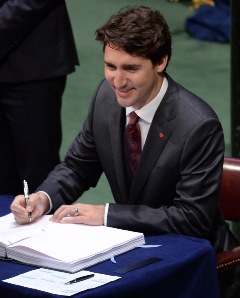 Prime Minister Justin Trudeau signs the Paris Agreement on climate change during a ceremony at the United Nations headquarters in New York on Friday, April 22, 2016. THE CANADIAN PRESS/Sean Kilpatrick