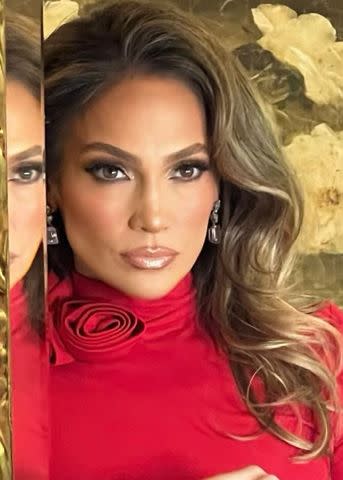 Jennifer Lopez gets in Christmas spirit with red workout leggings