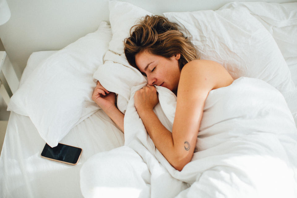 Snoozing your alarm actually makes you more tired when you finally do get out of bed. (Photo: Adam Kuylenstierna / EyeEm via Getty Images)